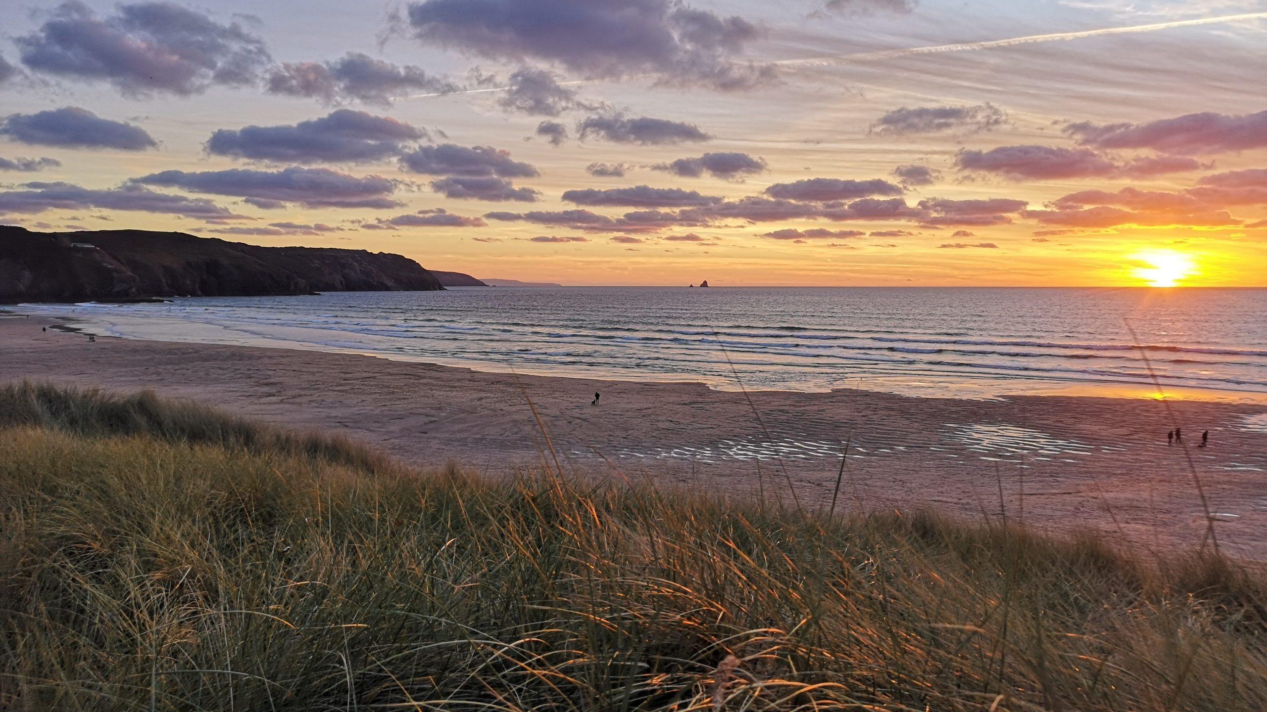 Perranporth beach in Cornwall at sunset