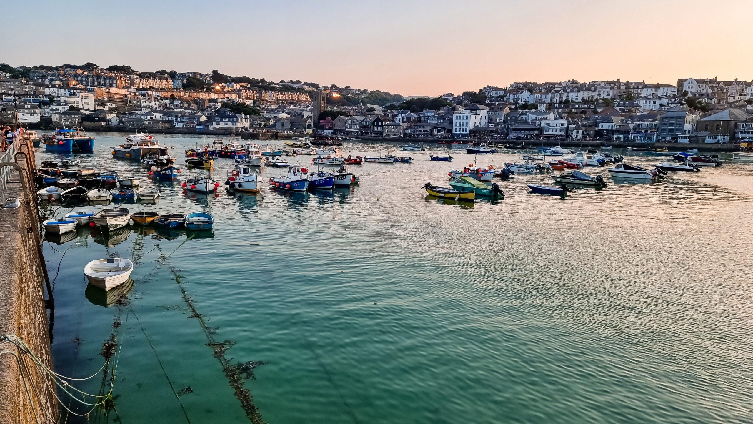 St Ives harbour front with boats at low tide, Cornwall