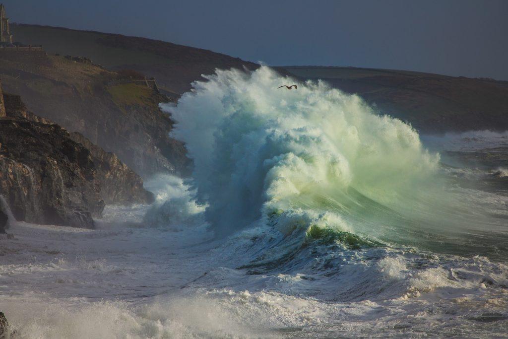 Porthleven storm watching during winter in Cornwall