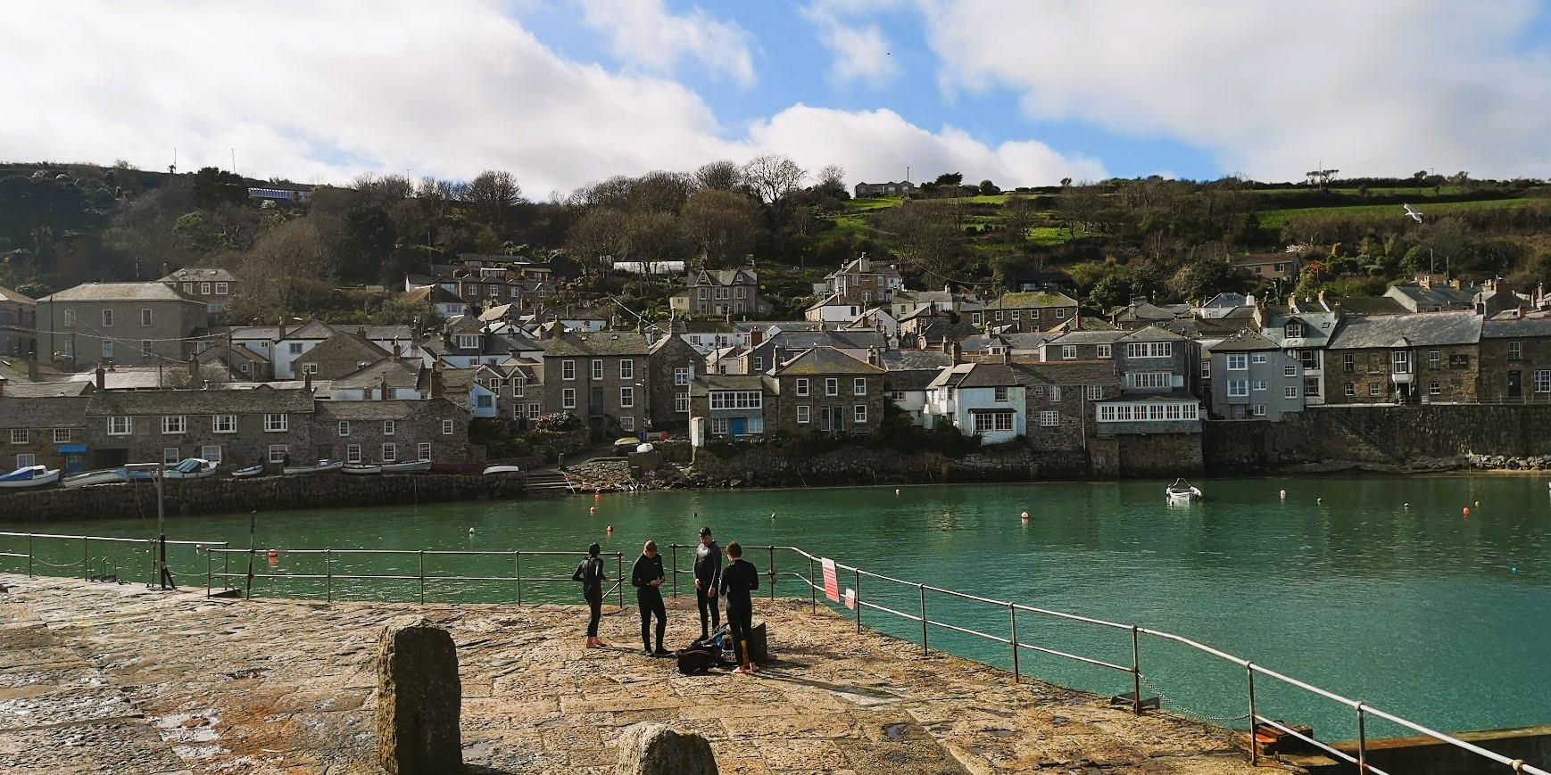 Swimming in the harbour at Mousehole, Cornwall
