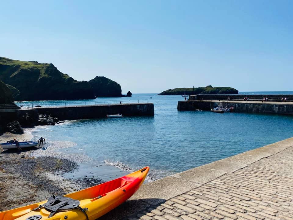 A kayak in mullion harbour ready to go to mullion island