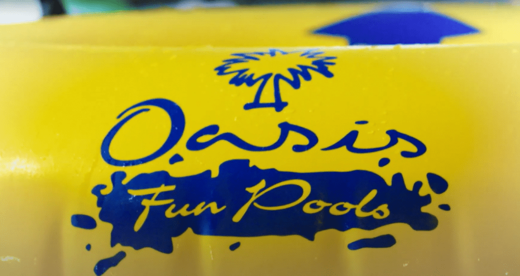 oasis fun pools logo on a rubber ring