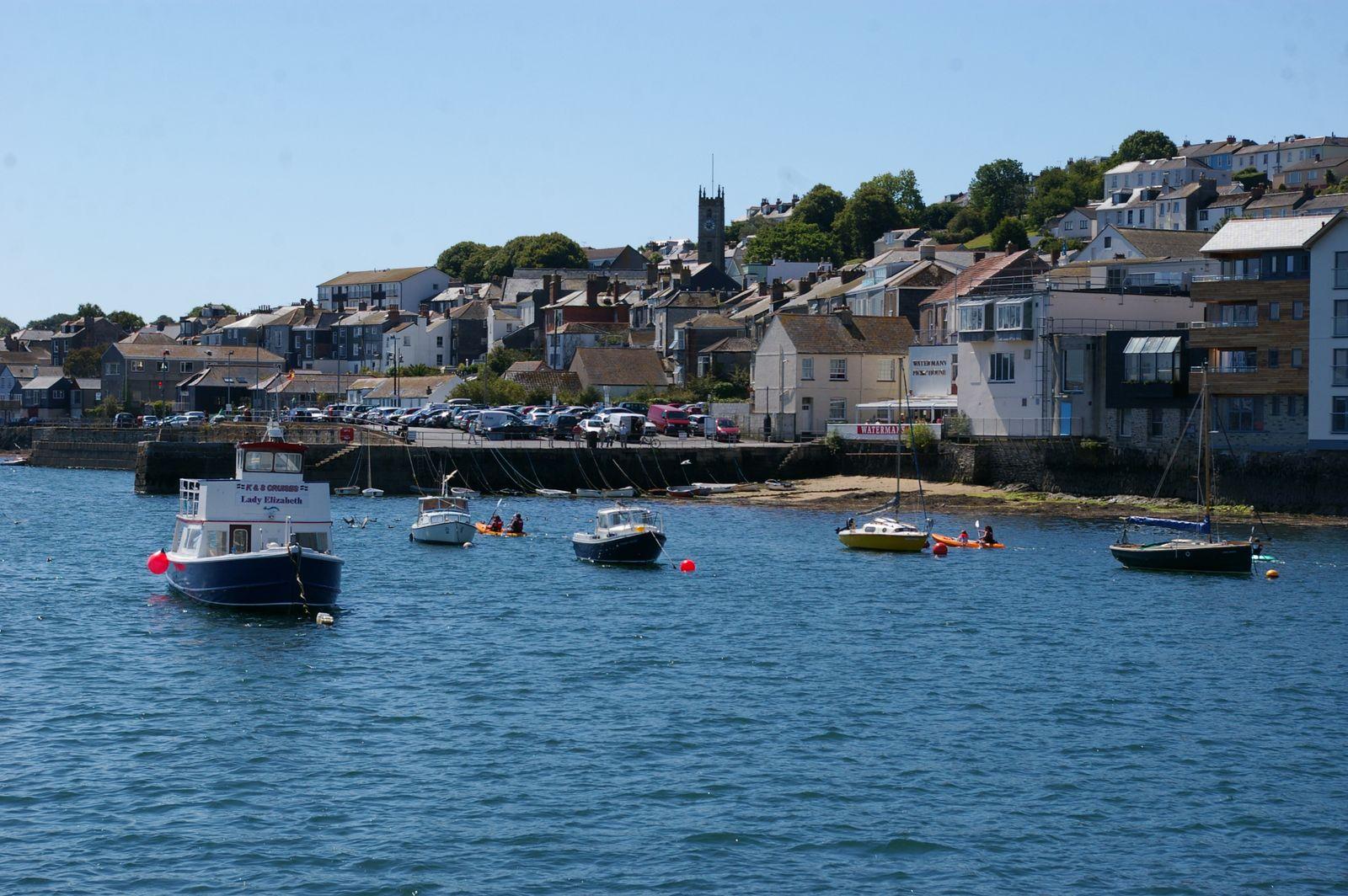 Colourful houses and boats along Falmouth harbour